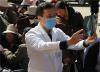 10月28日，北京解放军总医院神经外科医生尚爱加（中）在西藏堆龙德庆县羊达乡为群众义诊。（摄影：达穷）