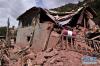 这是5月13日拍摄的嘎塔乡果东村受灾房屋。
