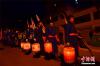 2月14日夜间，甘肃甘南藏族自治州舟曲县境内举行“东山转灯节”。