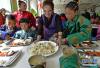 2月27日，在西藏自治区儿童福利院，老师端上热腾腾的水饺，欢庆藏历新年。