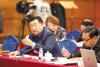 3月5日，出席全国政协十二届五次会议的西藏全国政协委员甲热·洛桑丹增在小组讨论会上发言。记者　次旺　摄