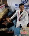 7月10日，来自北京的医学专家在西藏林芝为当地包虫病患者进行筛查以及手术救治。