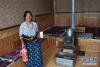 7月18日，甘肃省甘南藏族自治州碌曲县尕海乡尕秀村村民拉姆措在自家“牧家乐”的藏式客房内。新华社记者 陈斌 摄