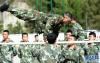 武警西藏森林总队察隅中队的战士在训练（7月12日摄）。新华社记者 觉果 摄