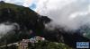 云雾缭绕的卡久寺（8月30日摄）。新华社记者 普布扎西摄