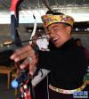 11月19日，西藏林芝市布久乡麦巴村村民射响箭迎新年。新华社记者 晋美多吉 摄
