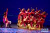 7月6日，在埃及开罗歌剧院，来自中国新疆维吾尔自治区艺术剧院的演员表演歌舞。