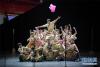12月12日，中央民族大学舞蹈学院的演员在表演舞蹈《阿嘎人》。