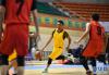 4月30日，在男篮赛场上，曲水县篮球队球员益西旦增（右二）在比赛中运球突破。新华社记者 晋美多吉摄