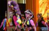 听障孩子们在台下手语老师的指挥下表演舞蹈《打墙舞》(5月18日摄)。 新华社记者 晋美多吉 摄