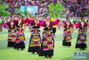 8月26日，日喀则农牧民群众演员身着特色民族服饰在开幕式上表演。