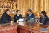 刘永革（左二）在那吾镇塔瓦行政村调研精准扶贫工作（10月21日摄）。新华社记者 姜伟超 摄