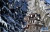 12月19日拍摄的位于拉萨市药王山上的查拉鲁普石窟。 12月18日，西藏拉萨市迎来今年入冬以来的首场降雪。19日清晨，拉萨雪后初霁，处处银装素裹，尽显雪域高原之美。 新华社记者觉果摄
