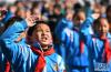 3月4日，在拉萨市第一小学，少先队员在升国旗仪式上向国旗敬礼。新华社记者 觉果 摄