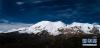 这是7月10日无人机拍摄的阿尼玛卿雪山。