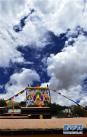 扎西坚白寺展佛活动上展出的释迦牟尼佛像唐卡（7月16日摄）。