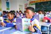 8月27日，在合作市第四小学，学生们在课堂上朗读课文。 新华社记者 陈君清 摄