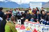 西藏林芝市米林县羌纳乡林巴村举行的“苹果大会”现场（10月26日摄）。 新华社记者 李鑫 摄