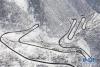 这是318国道剪子弯山段，大雪过后银装素裹（10月17日无人机拍摄）。