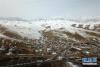 这是4月7日在天祝藏族自治县打柴沟镇境内拍摄的春日雪景（无人机照片）。新华社记者 范培珅 摄