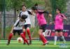 在拉萨首次举办的民间女子足球比赛——“亚克杯”女子足球赛上，雪域女足队队员次卓玛（左一）试图突破防守（2020年7月23日摄）。新华社记者 晋美多吉 摄