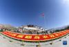 3月28日，布达拉宫广场举行升国旗仪式，庆祝西藏百万农奴解放纪念日。