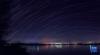 这是在拉萨市拉鲁湿地拍摄的以布达拉宫为前景的星轨照片（合成照片，11月26日摄）。