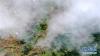 雨后扎尕那，村庄在雾气中若隐若现（10月13日摄，无人机照片）。 新华社记者 陈斌 摄