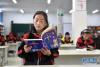 3月17日，在果洛藏族自治州甘德县岗龙乡寄宿制中心小学，学生在上阅读课。