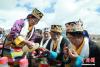 图为拉萨市墨竹工卡县莫冲村，村民在春耕仪式上互敬青稞酒。洛克 摄